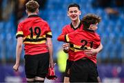 9 February 2024; Daniel Murray of CBC Monkstown, behind and Conor Scanlon, 21, celebrates after his side's victory in the Bank of Ireland Leinster Schools Junior Cup Round 1 match between CBC Monkstown and St Gerard's School at Energia Park in Dublin. Photo by Piaras Ó Mídheach/Sportsfile