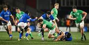 9 February 2024; Alex Usanov of Ireland is tackled by Luca Bellucci an Nicholas Gasperini of Italy during the U20 Six Nations Rugby Championship match between Ireland and Italy at Virgin Media Park in Cork. Photo by Brendan Moran/Sportsfile