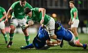 9 February 2024; Luke Murphy of Ireland is tackled by Federico Pisani and Nicholas Gasperini of Italy during the U20 Six Nations Rugby Championship match between Ireland and Italy at Virgin Media Park in Cork. Photo by Brendan Moran/Sportsfile
