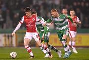 9 February 2024; Chris Forrester of St Patrick's Athletic in action against Darragh Nugent of Shamrock Rovers during the 2024 Men's President's Cup match between Shamrock Rovers and St Patrick's Athletic at Tallaght Stadium in Dublin. Photo by Stephen McCarthy/Sportsfile