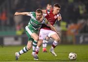 9 February 2024; Sean Hoare of Shamrock Rovers in action against Brandon Kavanagh of St Patrick's Athletic during the 2024 Men's President's Cup match between Shamrock Rovers and St Patrick's Athletic at Tallaght Stadium in Dublin. Photo by Stephen McCarthy/Sportsfile