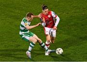 9 February 2024; Ruairi Keating of St Patrick's Athletic is tackled by Sean Hoare of Shamrock Rovers during the 2024 Men's President's Cup match between Shamrock Rovers and St Patrick's Athletic at Tallaght Stadium in Dublin. Photo by Tyler Miller/Sportsfile