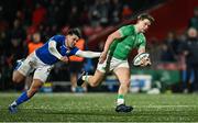 9 February 2024; Hugo McLaughlin of Ireland beats the tackle of Mirko Belloni of Italy during the U20 Six Nations Rugby Championship match between Ireland and Italy at Virgin Media Park in Cork. Photo by Brendan Moran/Sportsfile