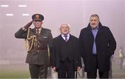 9 February 2024; President of Ireland Michael D Higgins, accompanied by his Aide-De-Camp, and FAI President Paul Cooke before the 2024 Men's President's Cup match between Shamrock Rovers and St Patrick's Athletic at Tallaght Stadium in Dublin. Photo by Stephen McCarthy/Sportsfile