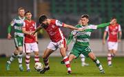 9 February 2024; Axel Sjoberg of St Patrick's Athletic in action against Darragh Burns of Shamrock Rovers during the 2024 Men's President's Cup match between Shamrock Rovers and St Patrick's Athletic at Tallaght Stadium in Dublin. Photo by Tyler Miller/Sportsfile