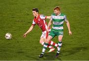 9 February 2024; Rory Gaffney of Shamrock Rovers in action against Axel Sjoberg of St Patrick's Athletic during the 2024 Men's President's Cup match between Shamrock Rovers and St Patrick's Athletic at Tallaght Stadium in Dublin. Photo by Stephen McCarthy/Sportsfile