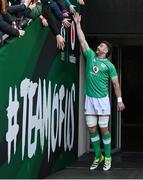 10 February 2024; Captain Caelan Doris attempts to high five supporters during an Ireland Rugby captain's run at the Aviva Stadium in Dublin. Photo by Brendan Moran/Sportsfile