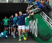 10 February 2024; James Lowe high fives supporters during an Ireland Rugby captain's run at the Aviva Stadium in Dublin. Photo by Brendan Moran/Sportsfile