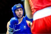 10 February 2024; Aoife O'Rourke of Ireland, left, in action against Li Qian of China in their middleweight 75kg semi-final bout during the 75th International Boxing Tournament Strandja in Sofia, Bulgaria. Photo by Ivan Ivanov/Sportsfile