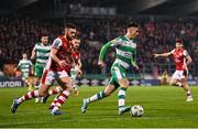 9 February 2024; Darragh Burns of Shamrock Rovers in action against Conor Keeley of St Patrick's Athletic during the 2024 Men's President's Cup match between Shamrock Rovers and St Patrick's Athletic at Tallaght Stadium in Dublin. Photo by Stephen McCarthy/Sportsfile