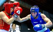10 February 2024; Aoife O'Rourke of Ireland, right, in action against Li Qian of China in their middleweight 75kg semi-final bout during the 75th International Boxing Tournament Strandja in Sofia, Bulgaria. Photo by Ivan Ivanov/Sportsfile
