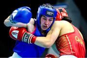 10 February 2024; Aoife O'Rourke of Ireland, left, in action against Li Qian of China in their middleweight 75kg semi-final bout during the 75th International Boxing Tournament Strandja in Sofia, Bulgaria. Photo by Ivan Ivanov/Sportsfile