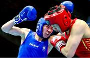 10 February 2024; Aoife O'Rourke of Ireland, left, in action against Li Qian of China in their middleweight 75kg semi-final bout during the 75th International Boxing Tournament Strandja in Sofia, Bulgaria. Photo by Ivan Ivanov/Sportsfile