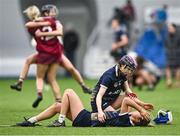 10 February 2024; Bronagh Moohan of UUM consoles her team-mate Amy McKenna, below, after their side's defeat in the Electric Ireland Ashling Murphy Cup final match between Ulster University Magee and Marino at University of Galway Connacht GAA Centre of Excellence in Bekan, Mayo. Photo by Piaras Ó Mídheach/Sportsfile