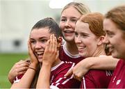 10 February 2024; Marino players, from left, Kate McClusky, Rose Sheridan and Orlaith O'Shea celebrate after their side's victory in the Electric Ireland Ashling Murphy Cup final match between Ulster University Magee and Marino at University of Galway Connacht GAA Centre of Excellence in Bekan, Mayo. Photo by Piaras Ó Mídheach/Sportsfile