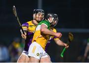 10 February 2024; Jason Sampson of Offaly attempts to get past Lee Chin of Wexford during the Allianz Hurling League Division 1 Group A match between Wexford and Offaly at Chadwicks Wexford Park in Wexford. Photo by Tyler Miller/Sportsfile