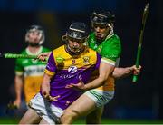 10 February 2024; Corey Byrne Dunbar of Wexford in action against Cathal King of Offaly during the Allianz Hurling League Division 1 Group A match between Wexford and Offaly at Chadwicks Wexford Park in Wexford. Photo by Tyler Miller/Sportsfile