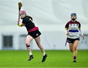 10 February 2024; Laura Freeney of University of Galway shoots as Creagh Lyons of University of Limerick looks on during the Electric Ireland Uí Mhaolagáin Cup final match between University of Limerick and University of Galway at University of Galway Connacht GAA Centre of Excellence in Bekan, Mayo. Photo by Piaras Ó Mídheach/Sportsfile