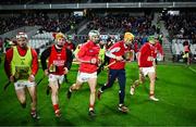 10 February 2024; Cork players break away after the team picture before the Allianz Hurling League Division 1 Group A match between Cork and Kilkenny at SuperValu Páirc Ui Chaoimh in Cork. Photo by Eóin Noonan/Sportsfile