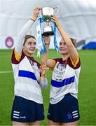 10 February 2024; University of Limerick joint-captains Creagh Lyons, left, and Míde Delaney lift the cup after their side's victory in the Electric Ireland Uí Mhaolagáin Cup final match between University of Limerick and University of Galway at University of Galway Connacht GAA Centre of Excellence in Bekan, Mayo. Photo by Piaras Ó Mídheach/Sportsfile