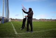 11 February 2024; Groundsman Martynas Zukauskas prepares the sideline flags before the Allianz Hurling League Division 1 Group B match between Westmeath and Limerick at TEG Cusack Park in Mullingar, Westmeath. Photo by Michael P Ryan/Sportsfile
