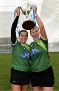 11 February 2024; Queens University Belfast joint captains Aine Graham, left, and Hannah Dorrian celebrate with the cup after their side's victory in the Electric Ireland Fr Meaghair Cup final match between Queens University Belfast and Ulster University Jordanstown at University of Galway Connacht GAA Centre of Excellence in Bekan, Mayo. Photo by Sam Barnes/Sportsfile