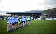 11 February 2024; The Dublin team stand for a minute's silence for the late Dublin senior football selector Shane O'Hanlon before the Allianz Hurling League Division 1 Group B match between Antrim and Dublin at Corrigan Park in Belfast. Photo by Ramsey Cardy/Sportsfile