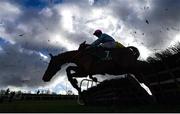 11 February 2024; Helvic Dream, with Sam Ewing up, jumps the last on their way to winning the Navan Ford and Opel Maiden Hurdle at Navan Racecourse in Meath. Photo by Seb Daly/Sportsfile