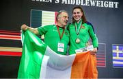 11 February 2024; From left, boxing coach Zaur Antia and Aoife O'Rourke of Ireland with her gold medal after winning Baison Manikon of Thailand in their middleweight 75kg semi-final bout during the 75th International Boxing Tournament Strandja in Sofia, Bulgaria. Photo by Liubomir Asenov /Sportsfile