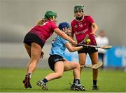 11 February 2024; Aimee Collier of SETU Carlow in action against Mairéad Dillon, left, and Catherine Hanley of University of Galway during the Electric Ireland Purcell Cup final match between University of Galway and SETU Carlow at University of Galway Connacht GAA AirDome in Bekan, Mayo. Photo by Sam Barnes/Sportsfile