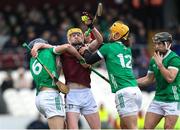 11 February 2024; David O'Reilly of Westmeath is tackled by Limerick players, David Reidy, left, and Tom Morrissey during the Allianz Hurling League Division 1 Group B match between Westmeath and Limerick at TEG Cusack Park in Mullingar, Westmeath. Photo by Michael P Ryan/Sportsfile