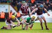 11 February 2024; Cathal O'Neill of Limerick in action against Westmeath players from left, Owen McCabe, David Williams, and Tommy Doyle during the Allianz Hurling League Division 1 Group B match between Westmeath and Limerick at TEG Cusack Park in Mullingar, Westmeath. Photo by Michael P Ryan/Sportsfile