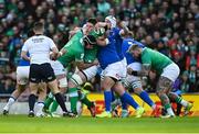 11 February 2024; Joe McCarthy of Ireland is tackled during the Guinness Six Nations Rugby Championship match between Ireland and Italy at the Aviva Stadium in Dublin. Photo by Brendan Moran/Sportsfile