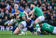 11 February 2024; Andrew Porter of Ireland is tackled by Manuel Zuliani of Italy during the Guinness Six Nations Rugby Championship match between Ireland and Italy at the Aviva Stadium in Dublin. Photo by Piaras Ó Mídheach/Sportsfile