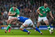 11 February 2024; Stuart McCloskey of Ireland is tackled by during the Guinness Six Nations Rugby Championship match between Ireland and Italy at the Aviva Stadium in Dublin. Photo by Brendan Moran/Sportsfile