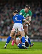 11 February 2024; Stuart McCloskey of Ireland is tackled by Stephen Varney, 9, and Michele Lamaro of Italy during the Guinness Six Nations Rugby Championship match between Ireland and Italy at the Aviva Stadium in Dublin. Photo by Brendan Moran/Sportsfile