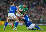 11 February 2024; Stuart McCloskey of Ireland is tackled by Stephen Varney, left, and Michele Lamaro of Italy during the Guinness Six Nations Rugby Championship match between Ireland and Italy at the Aviva Stadium in Dublin. Photo by Brendan Moran/Sportsfile