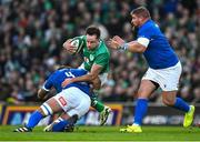 11 February 2024; Hugo Keenan of Ireland is tackled by Niccolo Cannone of Italy during the Guinness Six Nations Rugby Championship match between Ireland and Italy at the Aviva Stadium in Dublin. Photo by Brendan Moran/Sportsfile