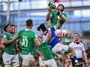 11 February 2024; Ryan Baird of Ireland battles for possession against Ange Capuozzo of Italy during the Guinness Six Nations Rugby Championship match between Ireland and Italy at the Aviva Stadium in Dublin. Photo by Piaras Ó Mídheach/Sportsfile