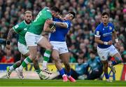 11 February 2024; Robbie Henshaw of Ireland is tackled by Tommaso Menoncello of Italy during the Guinness Six Nations Rugby Championship match between Ireland and Italy at the Aviva Stadium in Dublin. Photo by Brendan Moran/Sportsfile