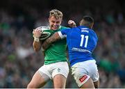 11 February 2024; Craig Casey of Ireland is tackled by Monty Ioane of Italy during the Guinness Six Nations Rugby Championship match between Ireland and Italy at the Aviva Stadium in Dublin. Photo by Brendan Moran/Sportsfile