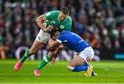 11 February 2024; Stuart McCloskey of Ireland is tackled by Monty Ioane of Italy during the Guinness Six Nations Rugby Championship match between Ireland and Italy at the Aviva Stadium in Dublin. Photo by Brendan Moran/Sportsfile