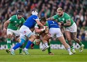 11 February 2024; Stuart McCloskey of Ireland is tackled by Manuel Zuliani, left, and Danilo Fischetti of Italy during the Guinness Six Nations Rugby Championship match between Ireland and Italy at the Aviva Stadium in Dublin. Photo by Ben McShane/Sportsfile