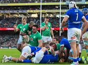 11 February 2024; Jack Conan of Ireland, second from right, celebrates with team-mate Andrew Porter after scoring their side's third try during the Guinness Six Nations Rugby Championship match between Ireland and Italy at the Aviva Stadium in Dublin. Photo by Ben McShane/Sportsfile