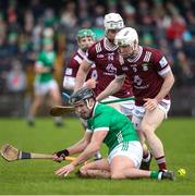 11 February 2024; Darragh O'Donovan of Limerick in action against Westmeath players, Shane McGovern, right, and Eoin Keys during the Allianz Hurling League Division 1 Group B match between Westmeath and Limerick at TEG Cusack Park in Mullingar, Westmeath. Photo by Michael P Ryan/Sportsfile