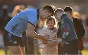 11 February 2024; Seán Currie of Dublin signs autographs after the Allianz Hurling League Division 1 Group B match between Antrim and Dublin at Corrigan Park in Belfast. Photo by Ramsey Cardy/Sportsfile