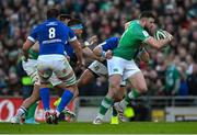 11 February 2024; Robbie Henshaw of Ireland is tackled by Pietro Ceccarelli of Italy during the Guinness Six Nations Rugby Championship match between Ireland and Italy at the Aviva Stadium in Dublin. Photo by Brendan Moran/Sportsfile