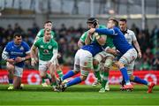 11 February 2024; Caelan Doris of Ireland is tackled by Manuel Zuliani, left, and Federico Ruzza of Italy during the Guinness Six Nations Rugby Championship match between Ireland and Italy at the Aviva Stadium in Dublin. Photo by Brendan Moran/Sportsfile