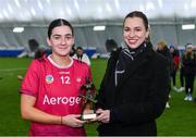 11 February 2024; Tegan Canning of University of Galway is presented with the Electric Ireland Player of the Match award by Aiste Petraityte, Electric Ireland Brand and Sponsorship Manager following her performance in the Electric Ireland Purcell Cup final match between University of Galway and SETU Carlow at University of Galway Connacht GAA AirDome in Bekan, Mayo. #FirstClassRivals Photo by Sam Barnes/Sportsfile