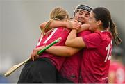 11 February 2024; University of Galway players, from left, Keisha Coleman, Tiffanie Fitzgerald  and Tegan Canning celebrate after their side's victory in the Electric Ireland Purcell Cup final match between University of Galway and SETU Carlow at University of Galway Connacht GAA AirDome in Bekan, Mayo. Photo by Sam Barnes/Sportsfile